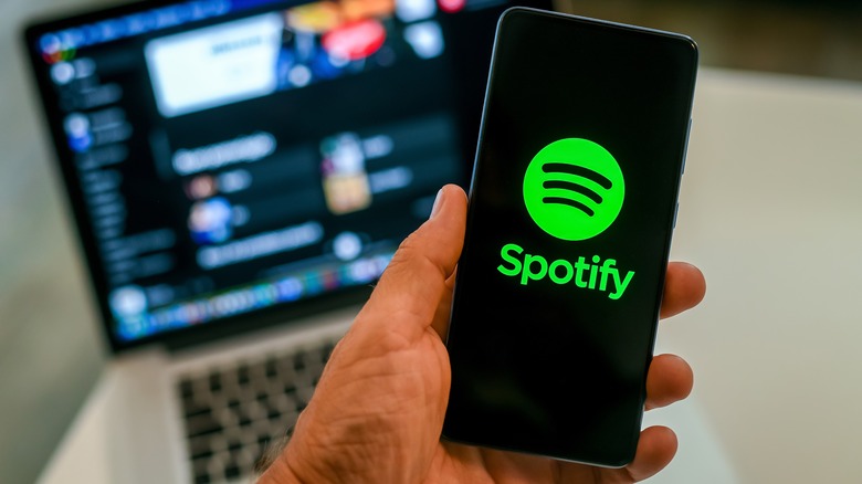 spotify on phone and laptop