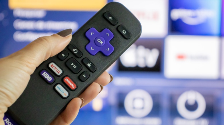 Roku remote in hand